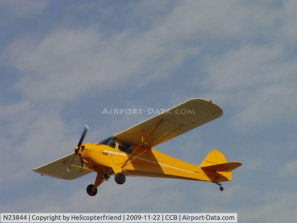 N23844, 1939 Taylorcraft BL-65 (L-2F) C/N 1480, Flying over Cable