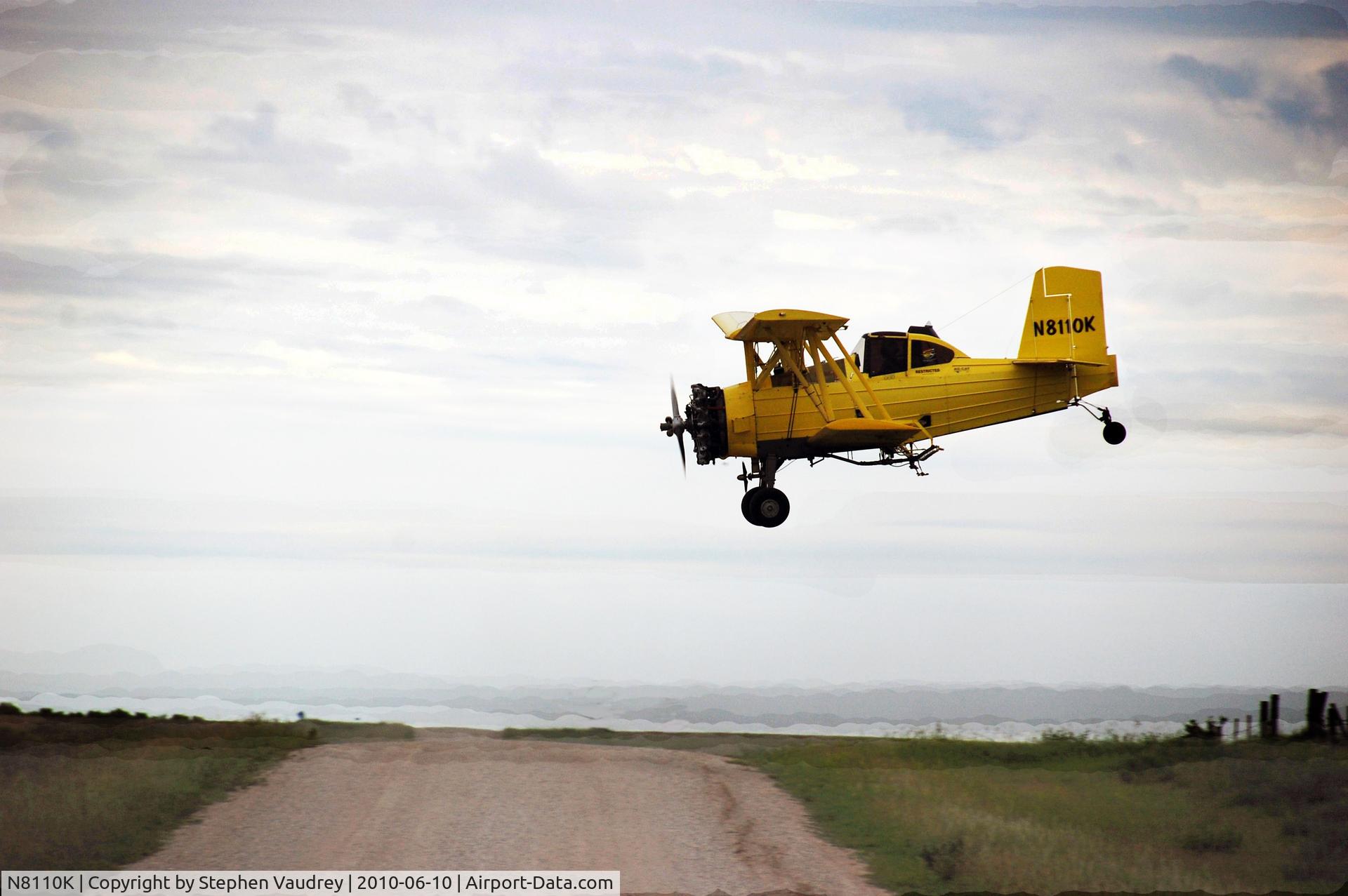 N8110K, 1979 Schweizer G-164B Ag-Cat B C/N 570B, Making another spraying approach NE of Watertown, SD.