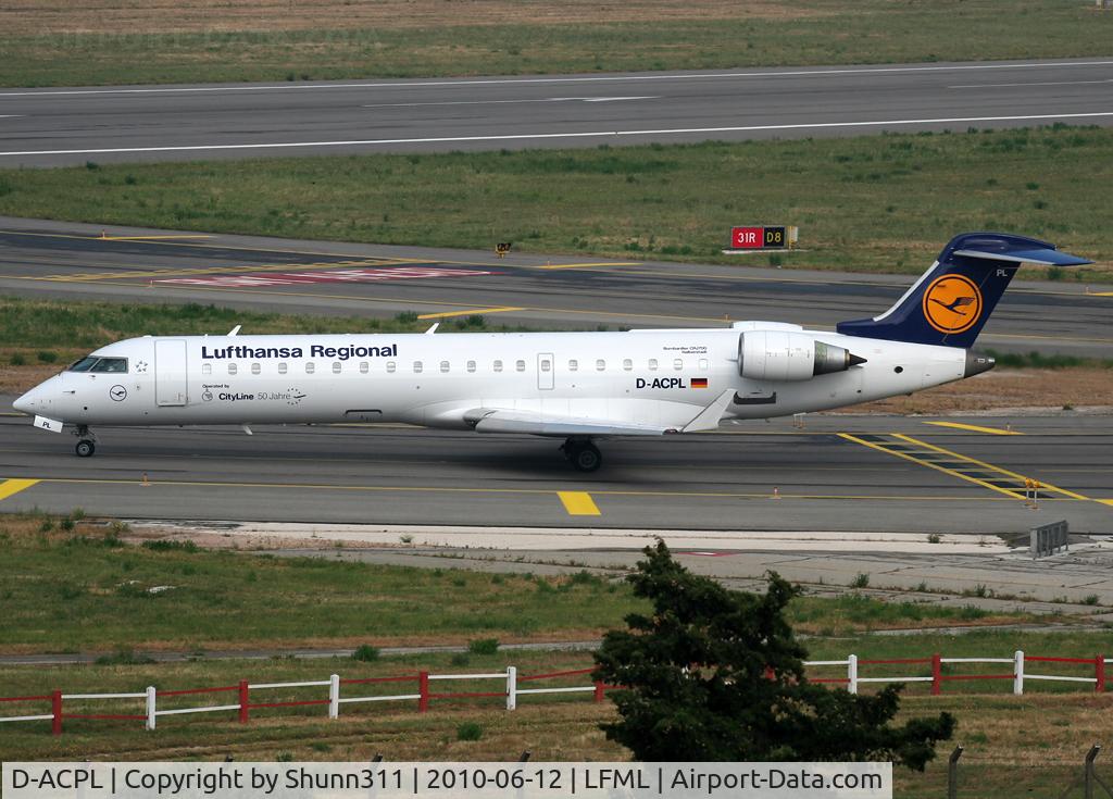 D-ACPL, 2002 Canadair CRJ-701ER (CL-600-2C10) Regional Jet C/N 10076, Taxiing holding point rwy 31R for departure...
