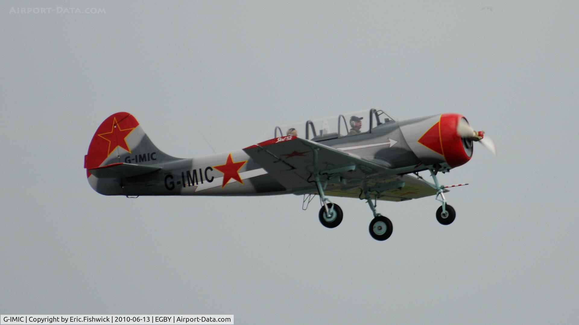 G-IMIC, 1989 Bacau Yak-52 C/N 8910001, G-IMIC Departing Bentwaters Park Airshow June 2010