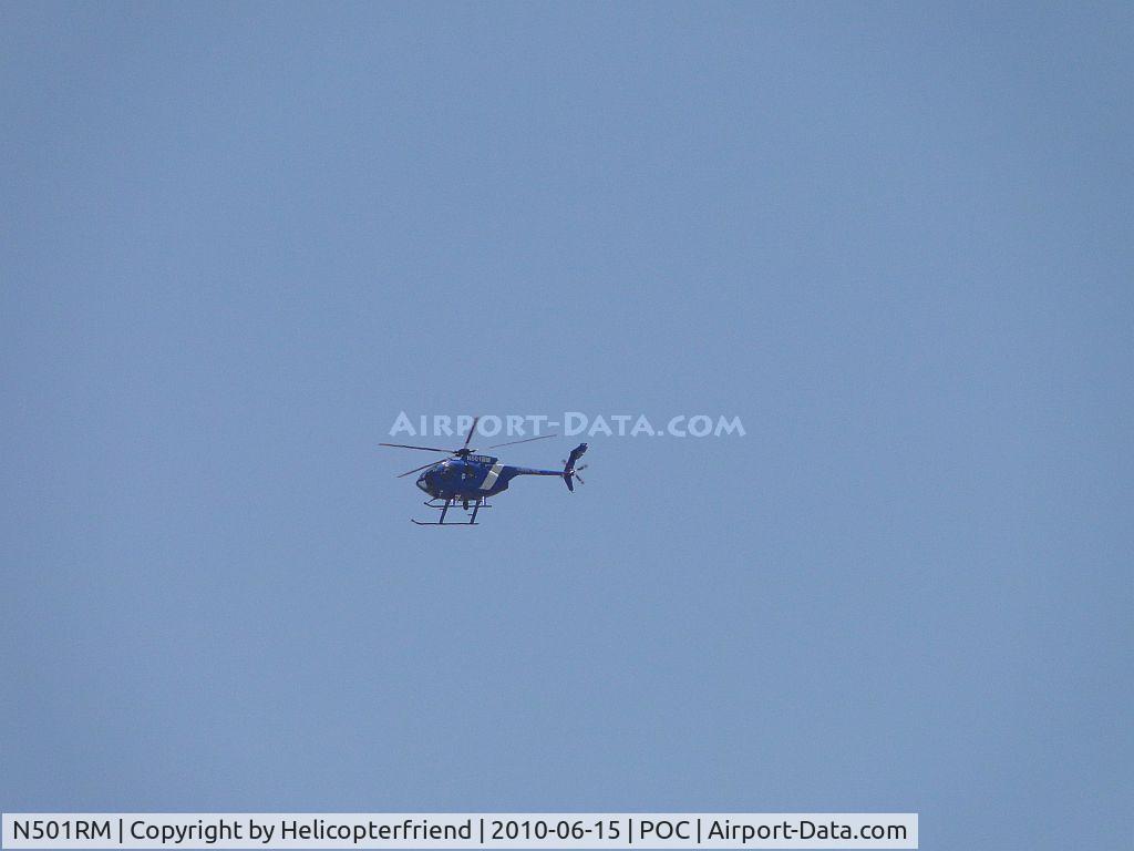 N501RM, 2009 MD Helicopters 369E C/N 0598E, Flying around IS 10 south of Brackett Airspace. Made several orbits before heading out eastbound