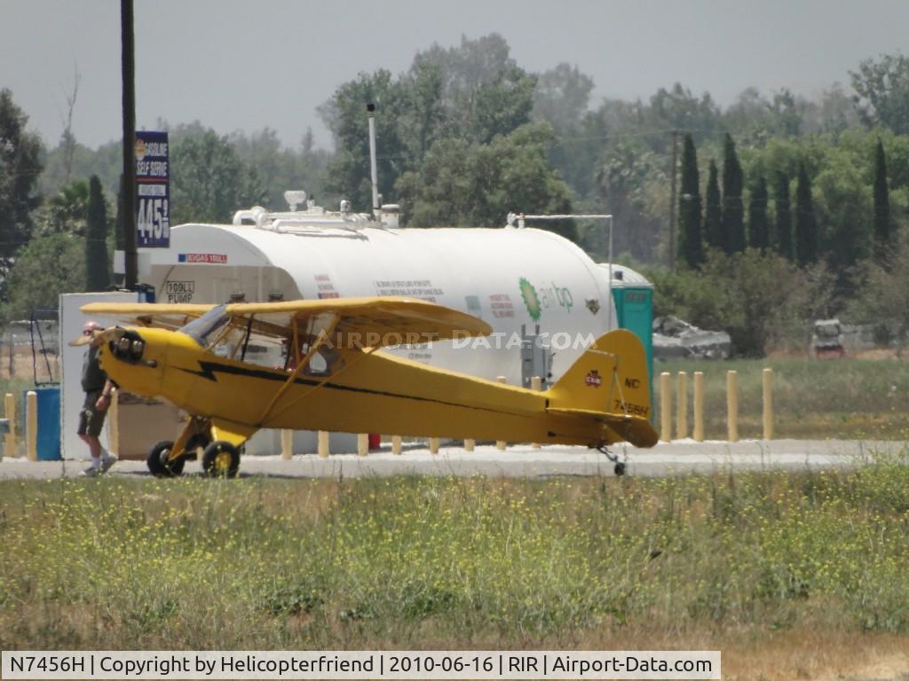 N7456H, 1946 Piper J3C-65 Cub C/N 20722, Refueling and getting ready to go
