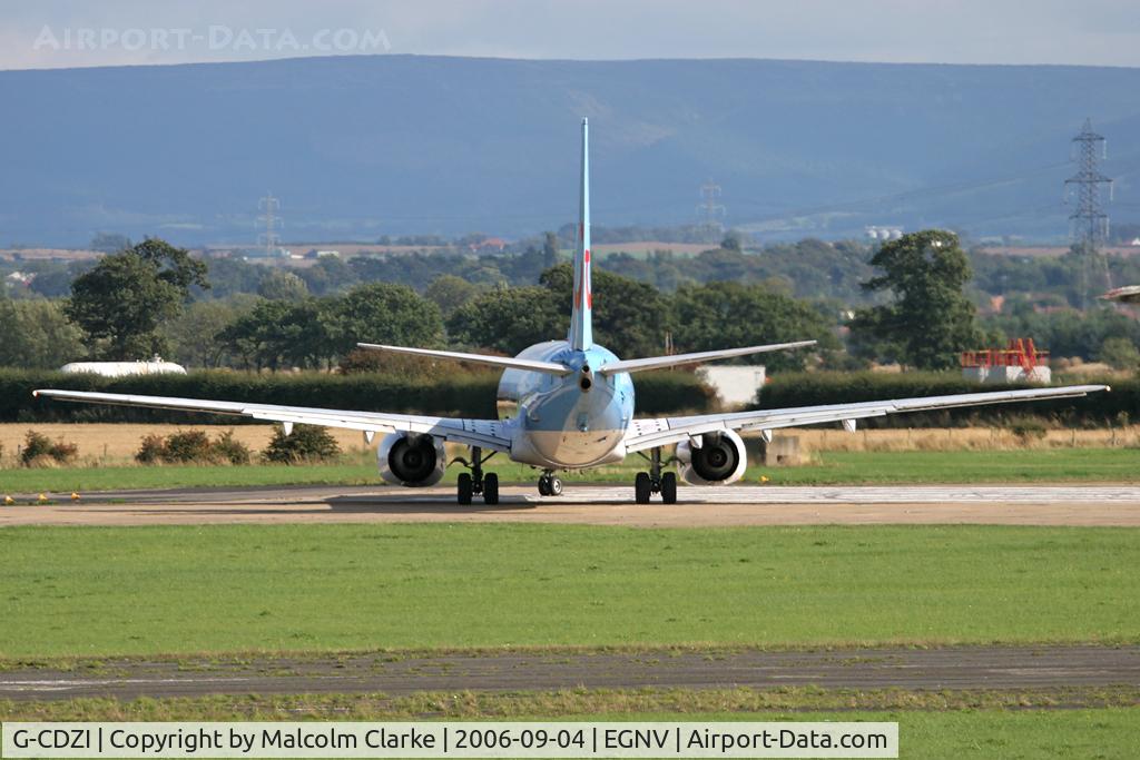 G-CDZI, 2000 Boeing 737-804 C/N 28229, Boeing 737-804 after back tracking the runway, turns to take off on 23 at Durham Tees Valley in September 2006.