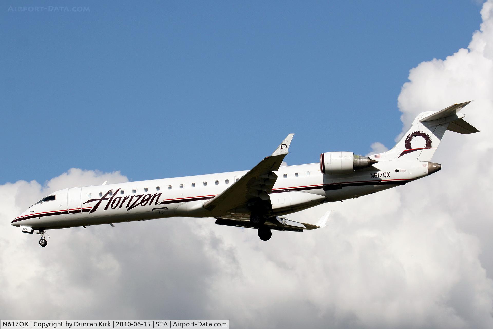 N617QX, 2003 Bombardier CRJ-701 (CL-600-2C10) Regional Jet C/N 10130, Darn....not one of the university colors!