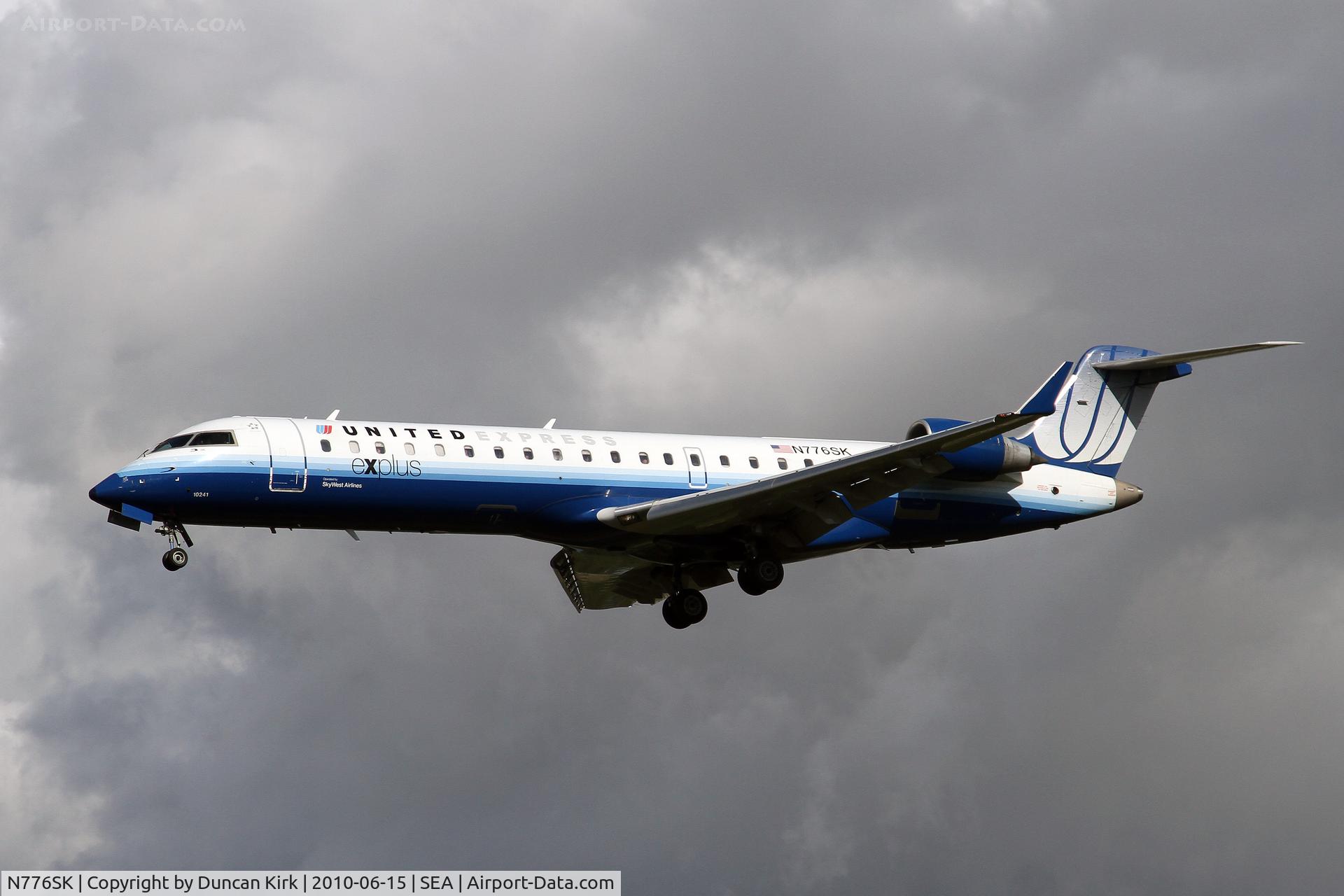 N776SK, 2006 Bombardier CRJ-700 (CL-600-2C10) Regional Jet C/N 10241, A beautiful backdrop!