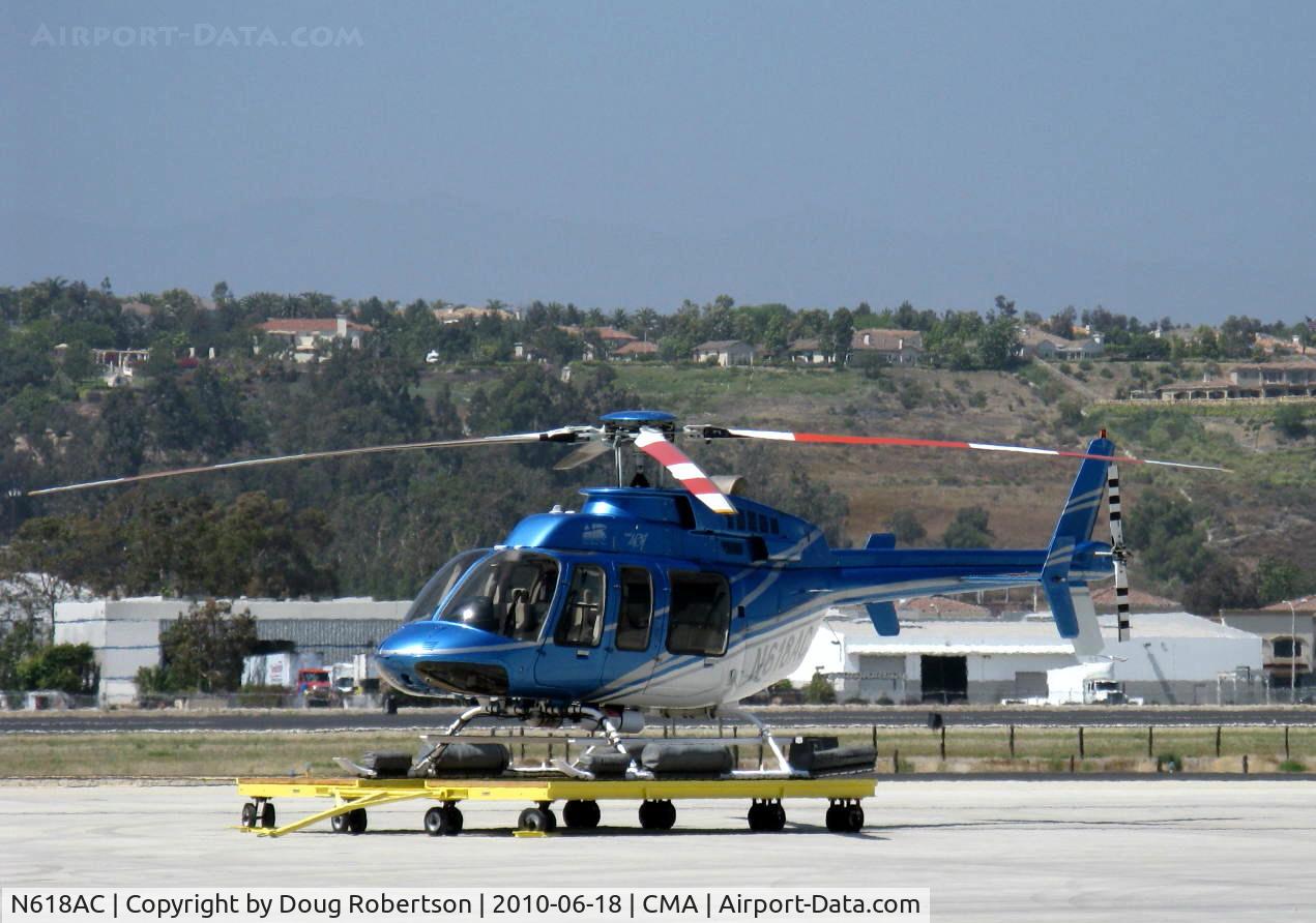 N618AC, 1997 Bell 407 C/N 53153, 1997 Bell 407, one Rolls Royce (Allison) 250-C47 Turboshaft with FADEC, 814 shp for takeoff, 700 shp continuous. Max hook capacity 2,645 lbs. Max takeoff with internal load 5,000 lbs. Max takeoff with sling load 5,500 lbs. At SUN AIR JETS ramp on dolly