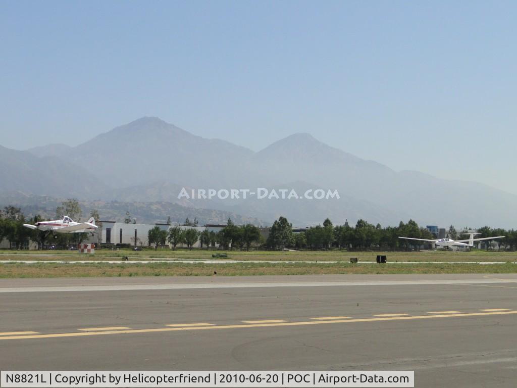 N8821L, 1971 Piper PA-25-260 C/N 25-5326, Lifting off 26L with N624RM in tow, heading west and then north to the mountain area