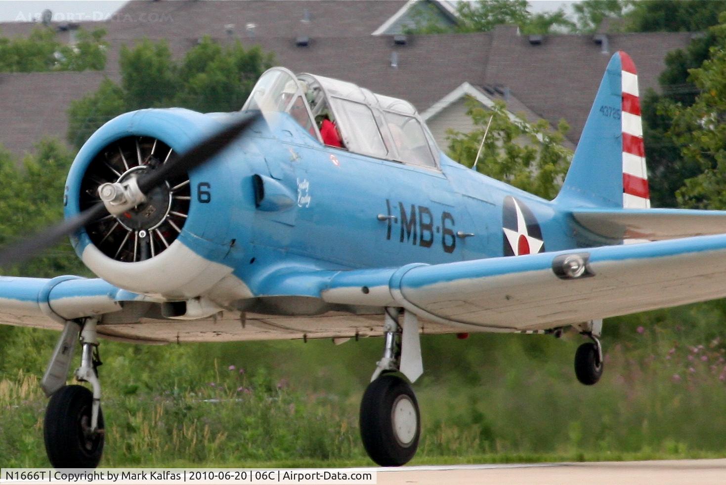 N1666T, North American SNJ-5B Texan C/N 43725, North American SNJ-5B, departing RWY 11 06C (Schaumburg, IL).