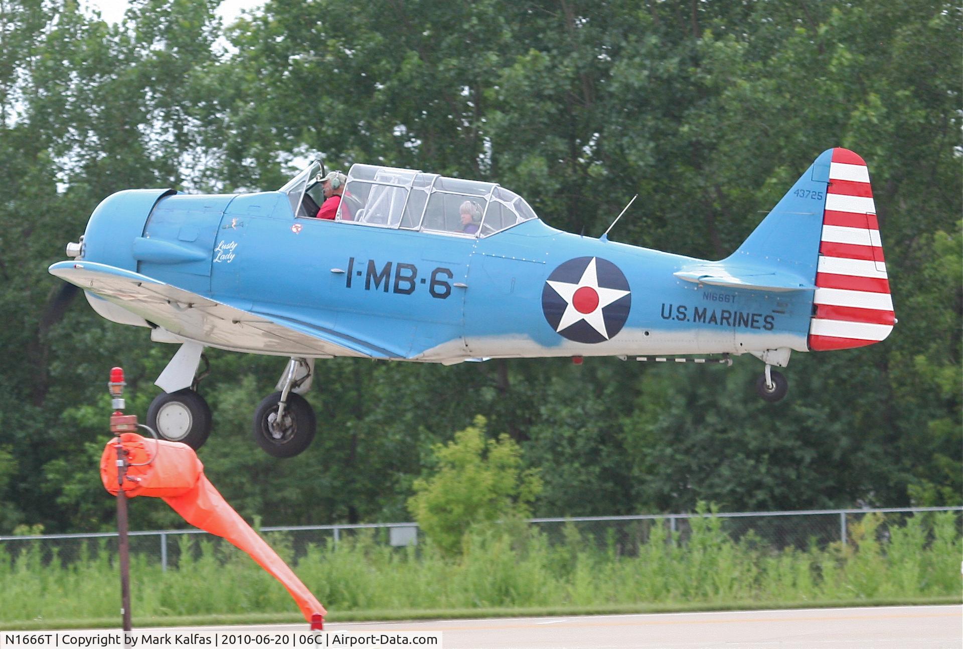 N1666T, North American SNJ-5B Texan C/N 43725, North American SNJ-5B, departing RWY 11 06C (Schaumburg, IL).