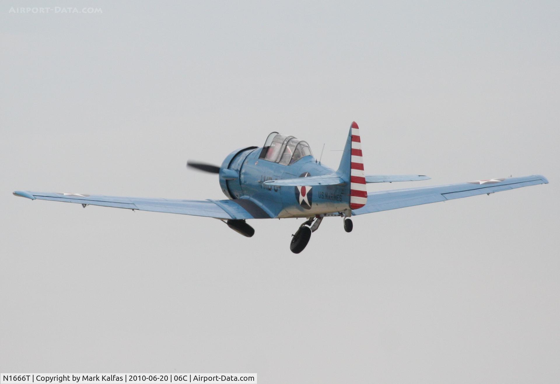 N1666T, North American SNJ-5B Texan C/N 43725, North American SNJ-5B, departing RWY 11 06C (Schaumburg, IL).