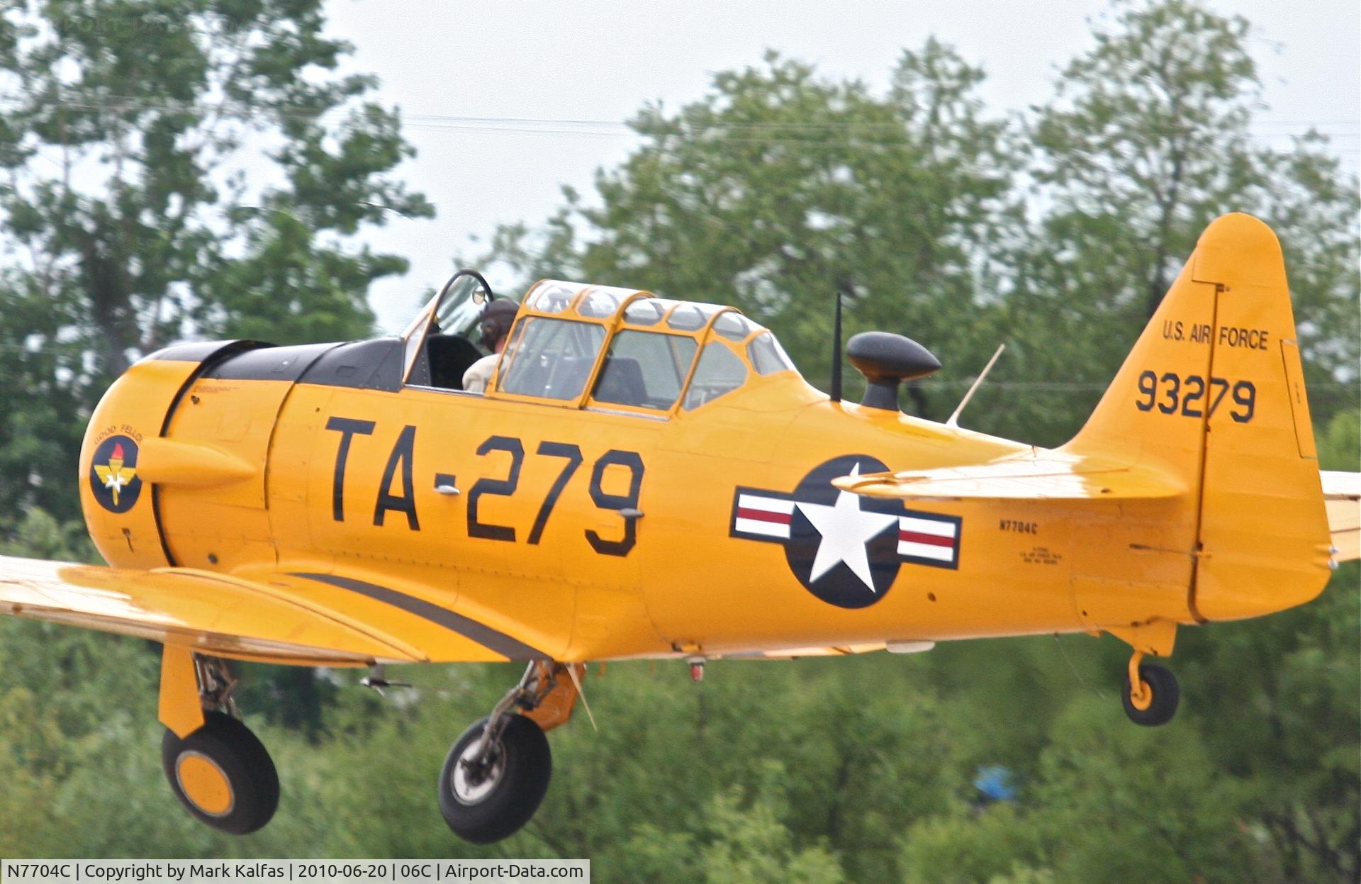 N7704C, 1949 North American T-6G Texan C/N 168-383, North American T-6GB, departing RWY 11 06C (Schaumburg, IL).
