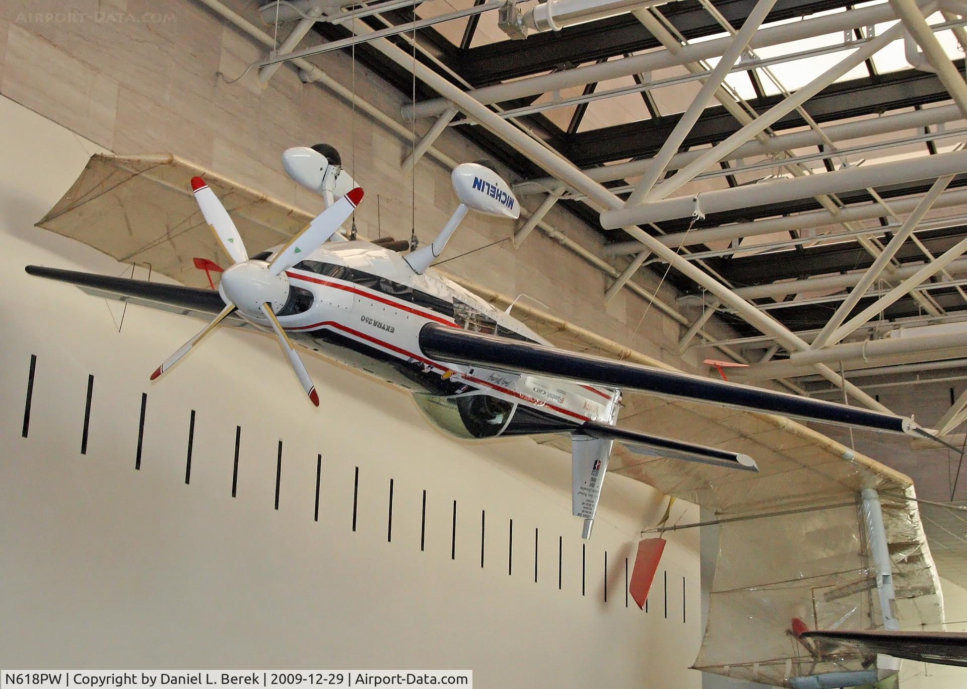N618PW, 1987 Extra EA-260 C/N 001, Patty Wagstaff's aerobatic aircraft has been refurbished and now hangs inverted in the main gallery of the NASM.