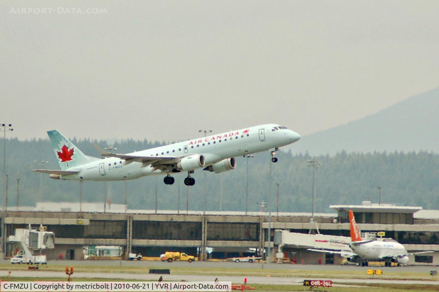 C-FMZU, 2007 Embraer 190AR (ERJ-190-100IGW) C/N 19000118, take off from YVR