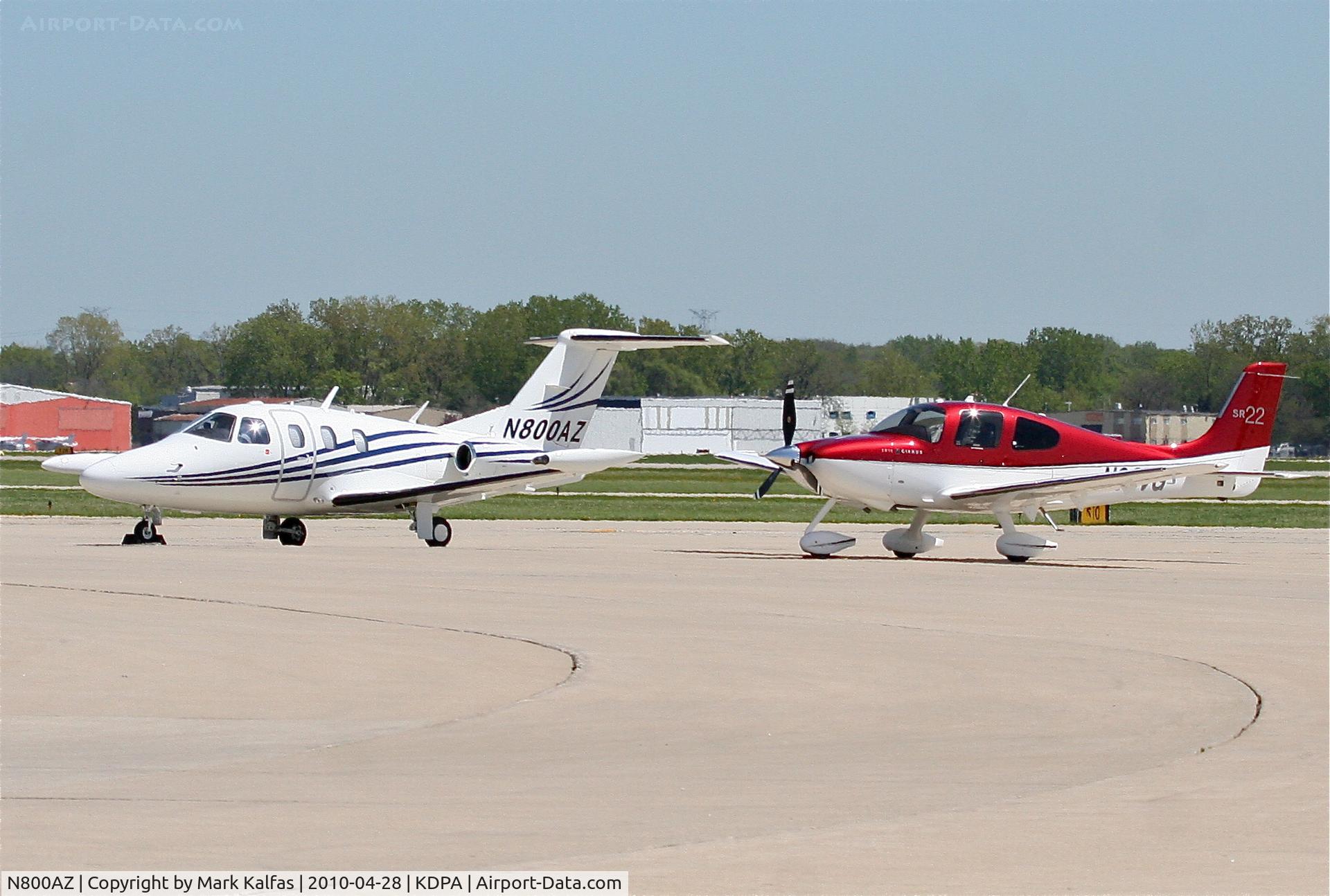 N800AZ, 2008 Eclipse Aviation Corp EA500 C/N 000153, FFI Aircraft, Eclipse EA500 on the ramp KDPA with a size good comparison to the SR-22.