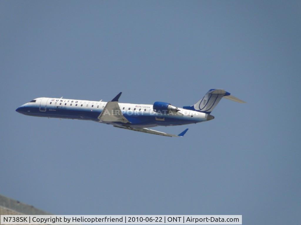 N738SK, 2005 Bombardier CRJ-700 (CL-600-2C10) Regional Jet C/N 10195, Sky Wests United Express loaded up and departing 26R