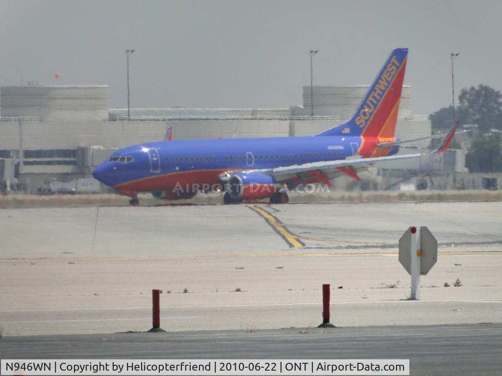 N946WN, 2010 Boeing 737-7H4 C/N 36918, Slowing down after landing on runway 26R