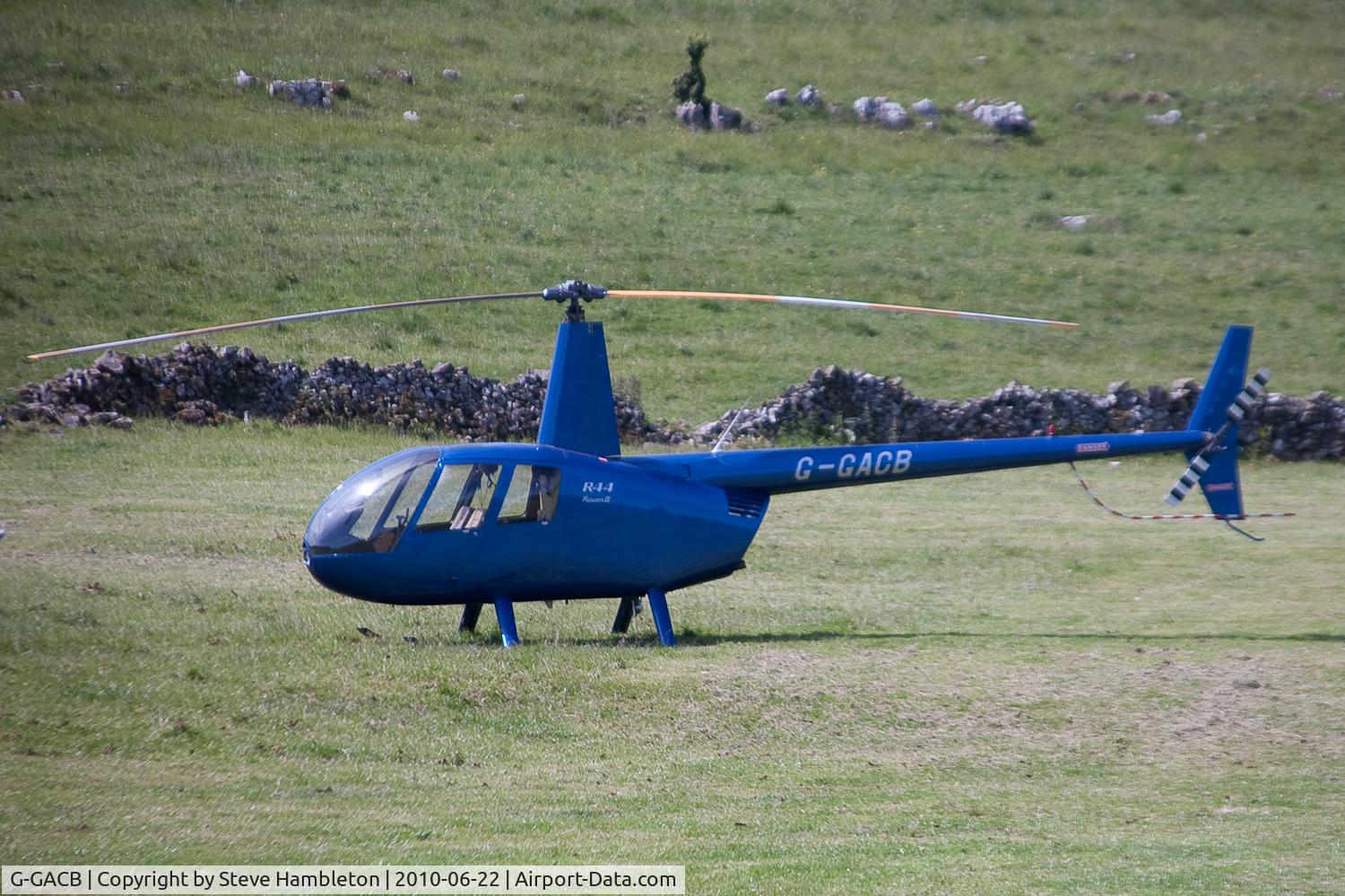 G-GACB, 2003 Robinson R44 Raven II C/N 10243, At Buxton, Derbyshire for the bi-annual Hillhead quarrying exhibition