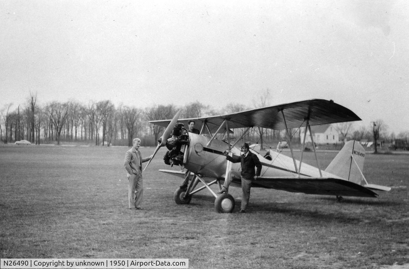 N26490, 1941 Meyers OTW-160 C/N 43, OTW being looked over by my father (on right) on two friends.  He was ex-USAF and taught the others to fly it.