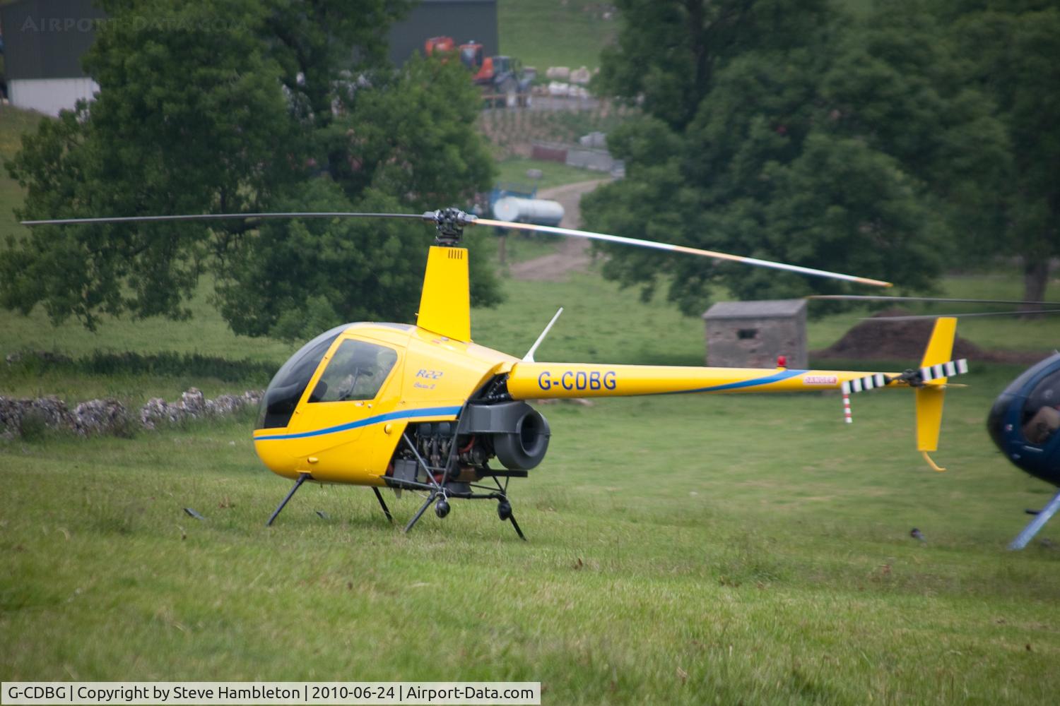 G-CDBG, 2004 Robinson R22 Beta II C/N 3682, At Buxton, Derbyshire for the bi-annual Hillhead quarrying exhibition