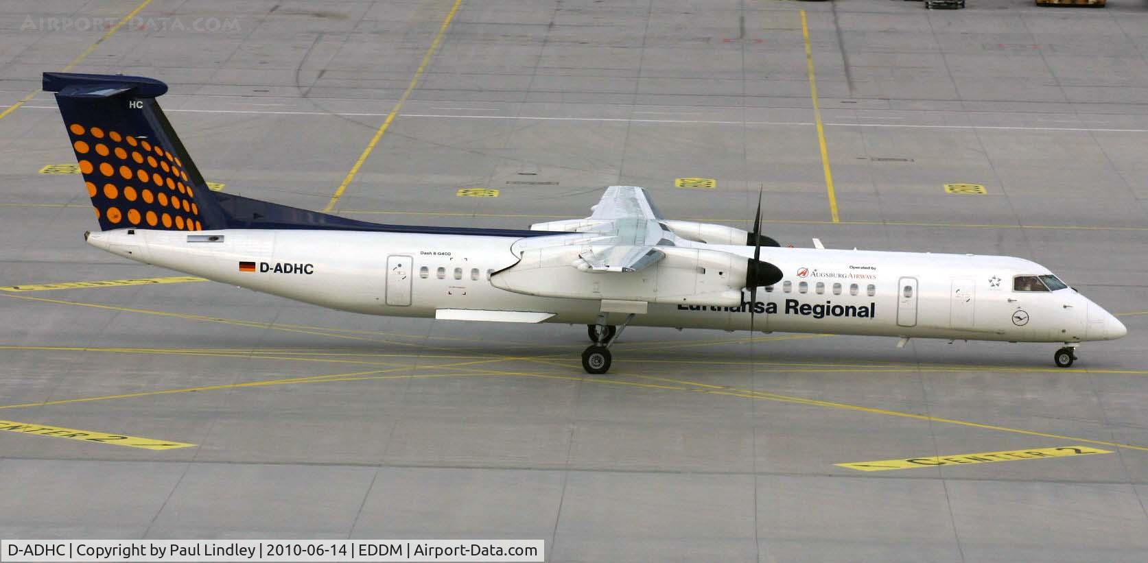 D-ADHC, 2001 De Havilland Canada DHC-8-402Q Dash 8 C/N 4045, strumming past the viewing terrace