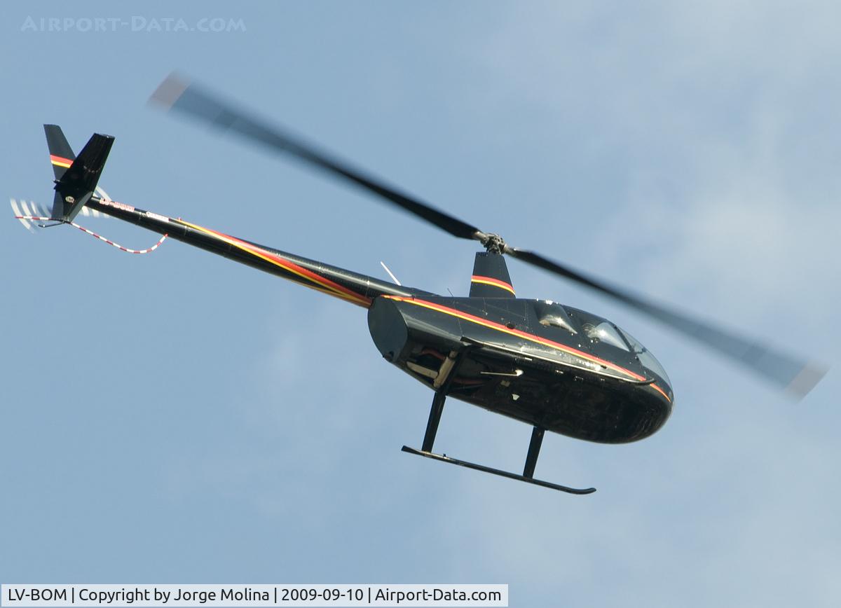 LV-BOM, Robinson R44 Raven II C/N 12018, Low pass over Quilmes...