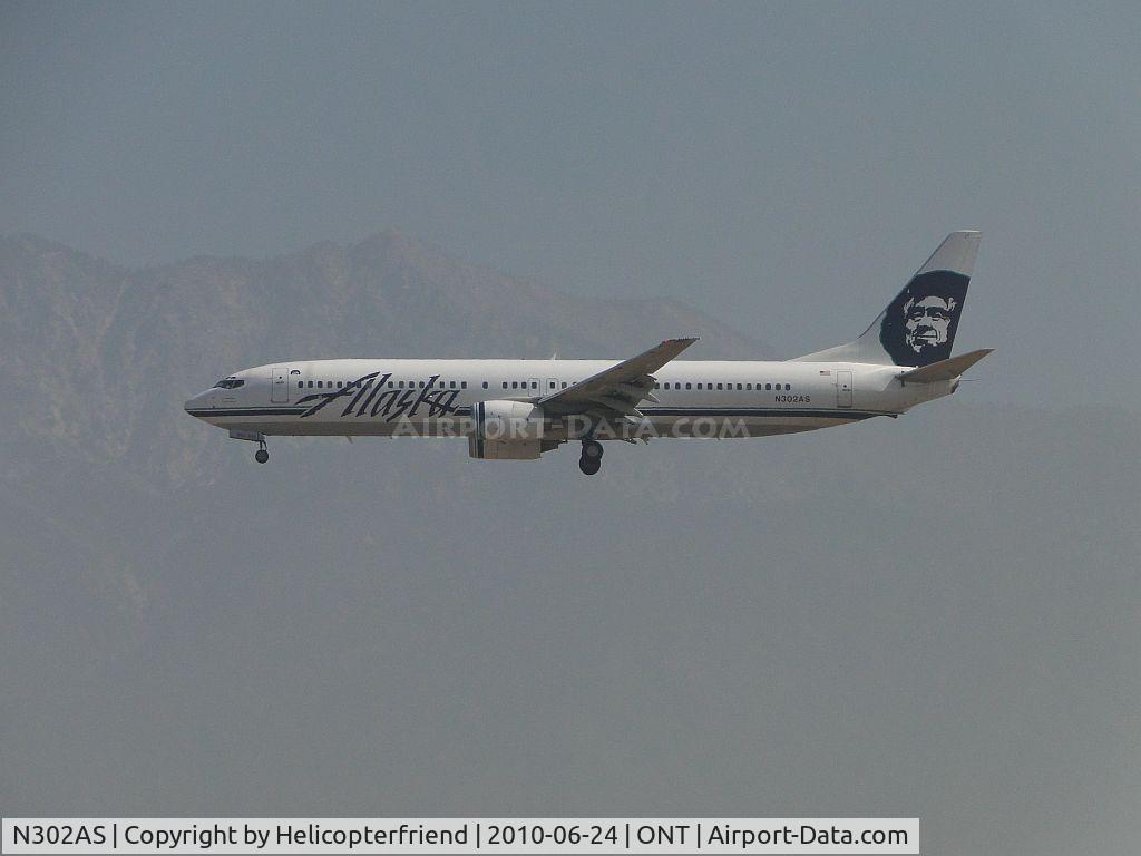 N302AS, 2003 Boeing 737-990 C/N 30017, On final to runway 26R