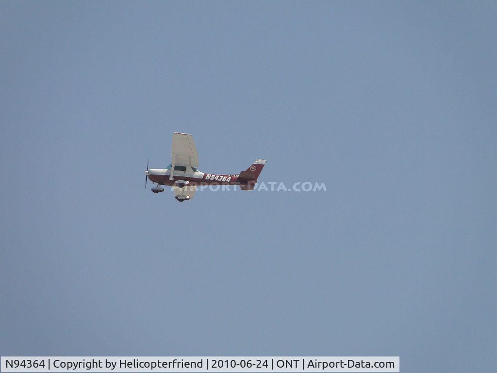 N94364, 1982 Cessna 152 C/N 15285655, Brackett based plane making a flyover