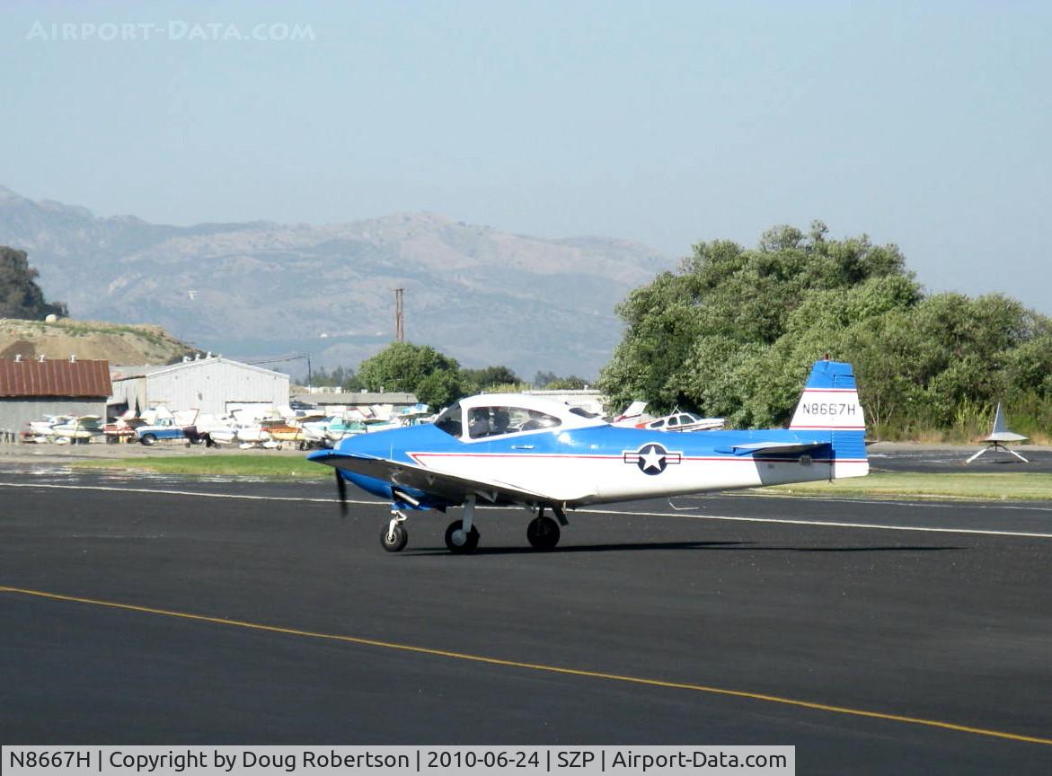 N8667H, 1947 North American Navion C/N NAV-4-667, 1947 North American NAVION, 285 Hp Continental conversion, taxiing off the active. This aircraft has given over 600 Young Eagles rides.