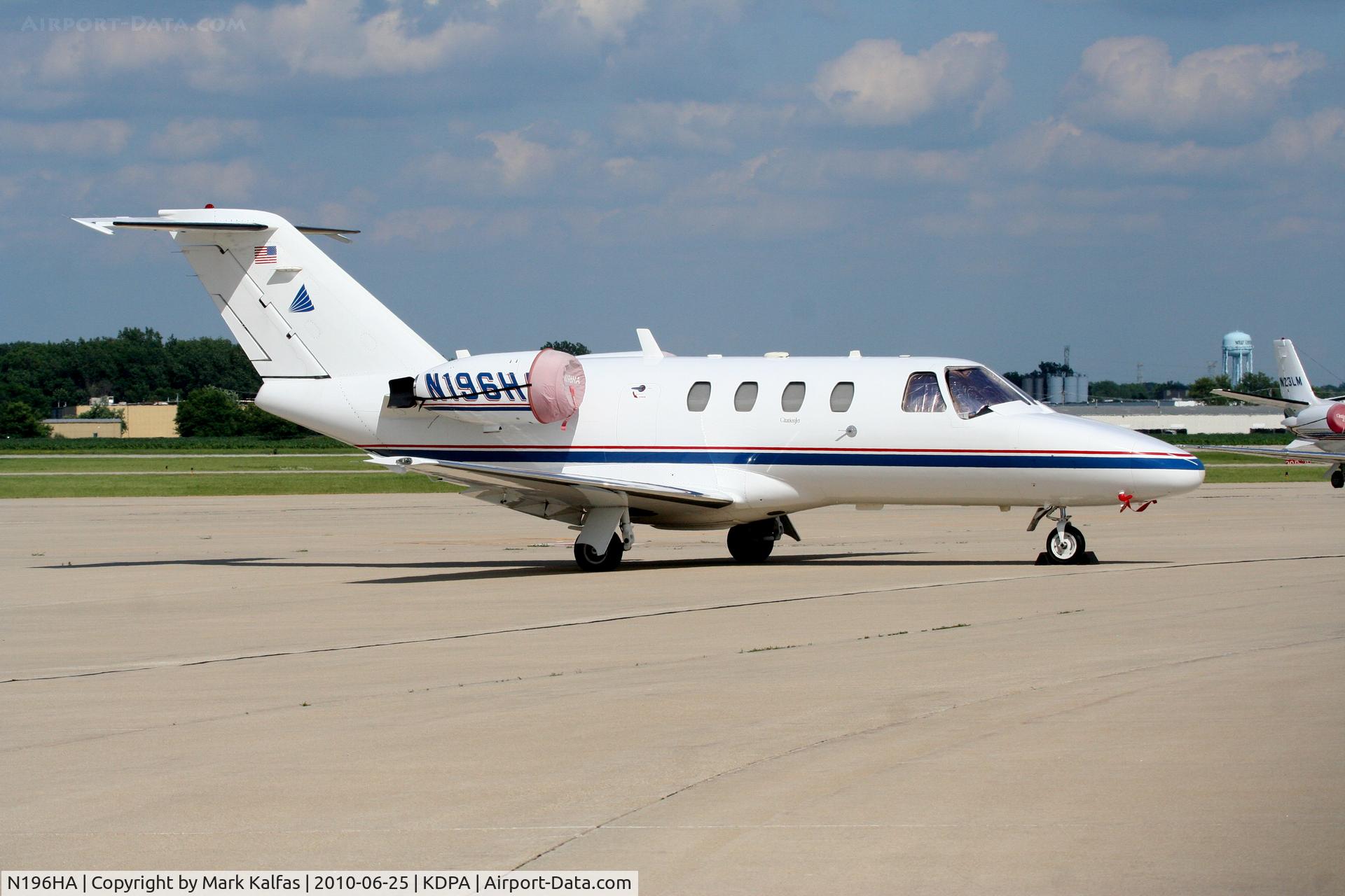N196HA, 1998 Cessna 525 CitationJet C/N 525-0256, Papercone Corporation Cessna 525 CJ1 N196HA, on the ramp KDPA.
