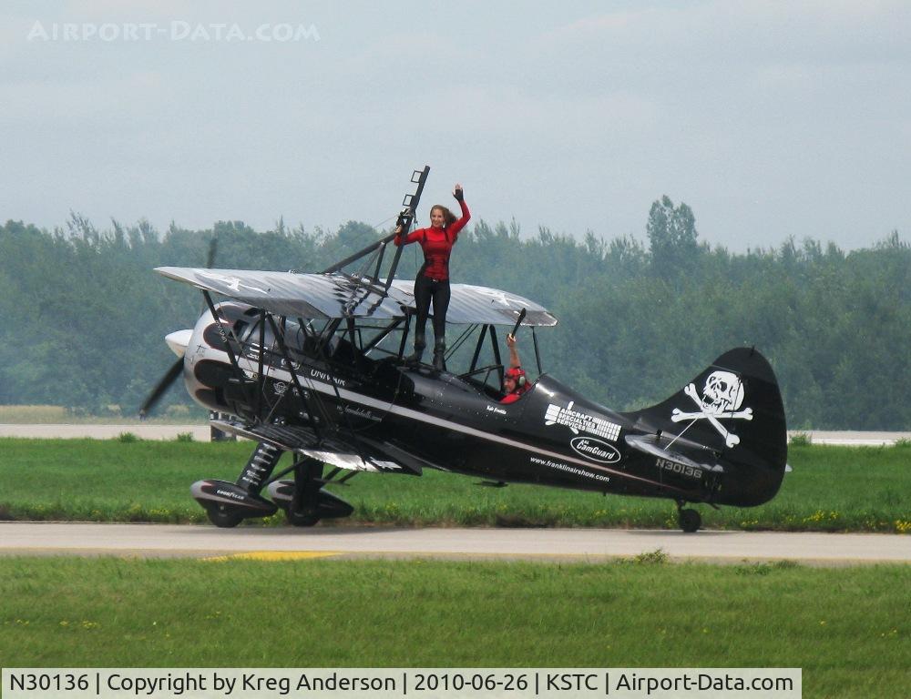 N30136, 1980 Waco UPF-7 C/N 5533, Kyle and Amanda Franklin taxiing back to the staging area after their Pirated Skies act at The Great Minnesota Airshow 2010.