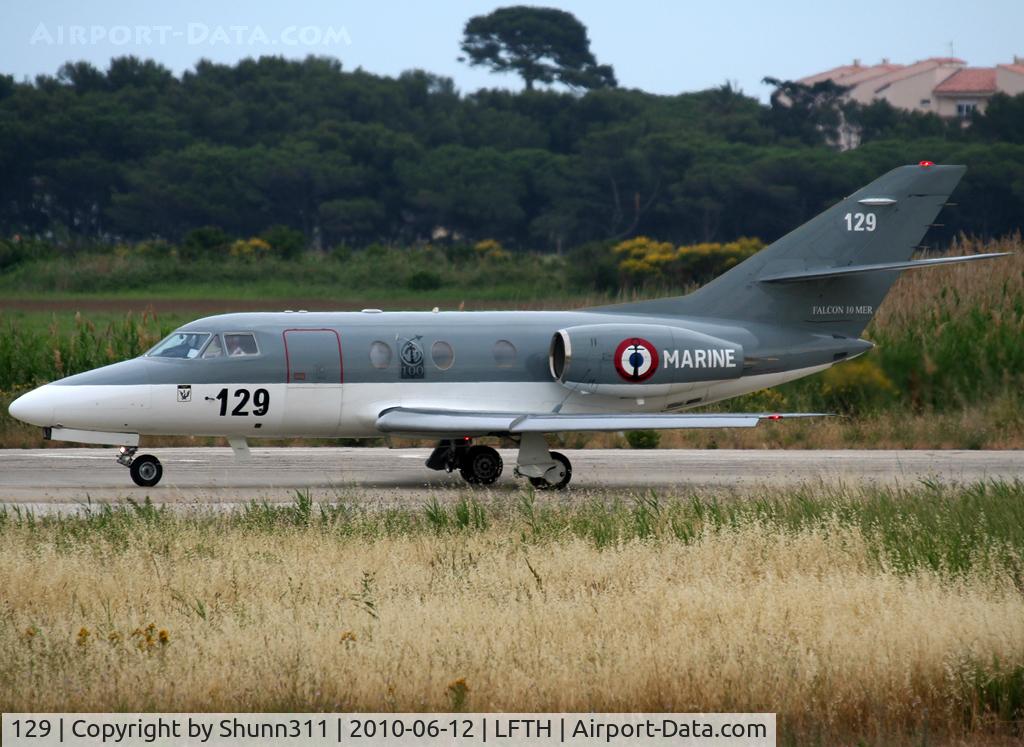 129, 1978 Dassault Falcon 10MER C/N 129, Taxiing for departure and with additional patch '100th anniversary' on ly on left side...