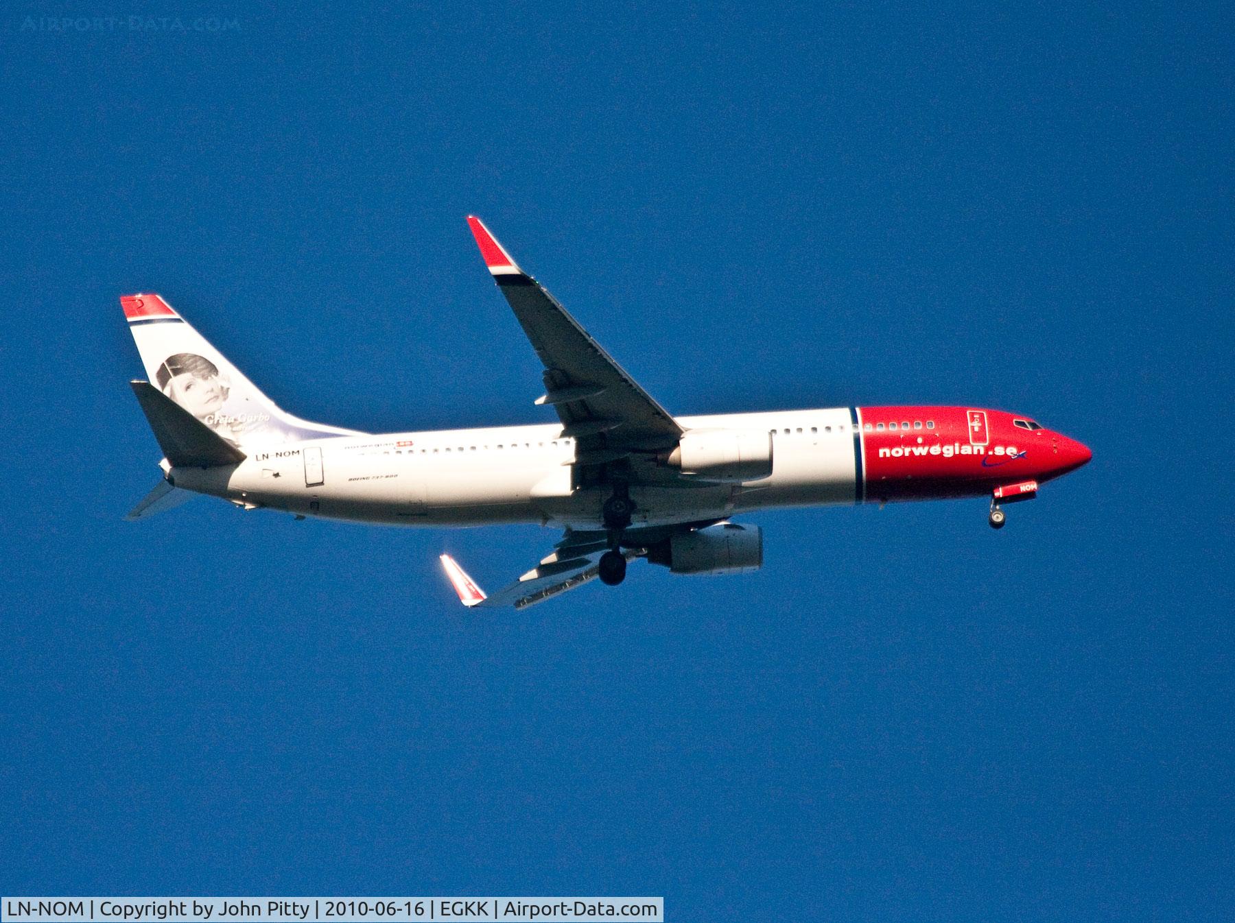 LN-NOM, 2001 Boeing 737-86N C/N 28642, Going round - Gatwick missed approach 08R - over Horsham, West Sussex.