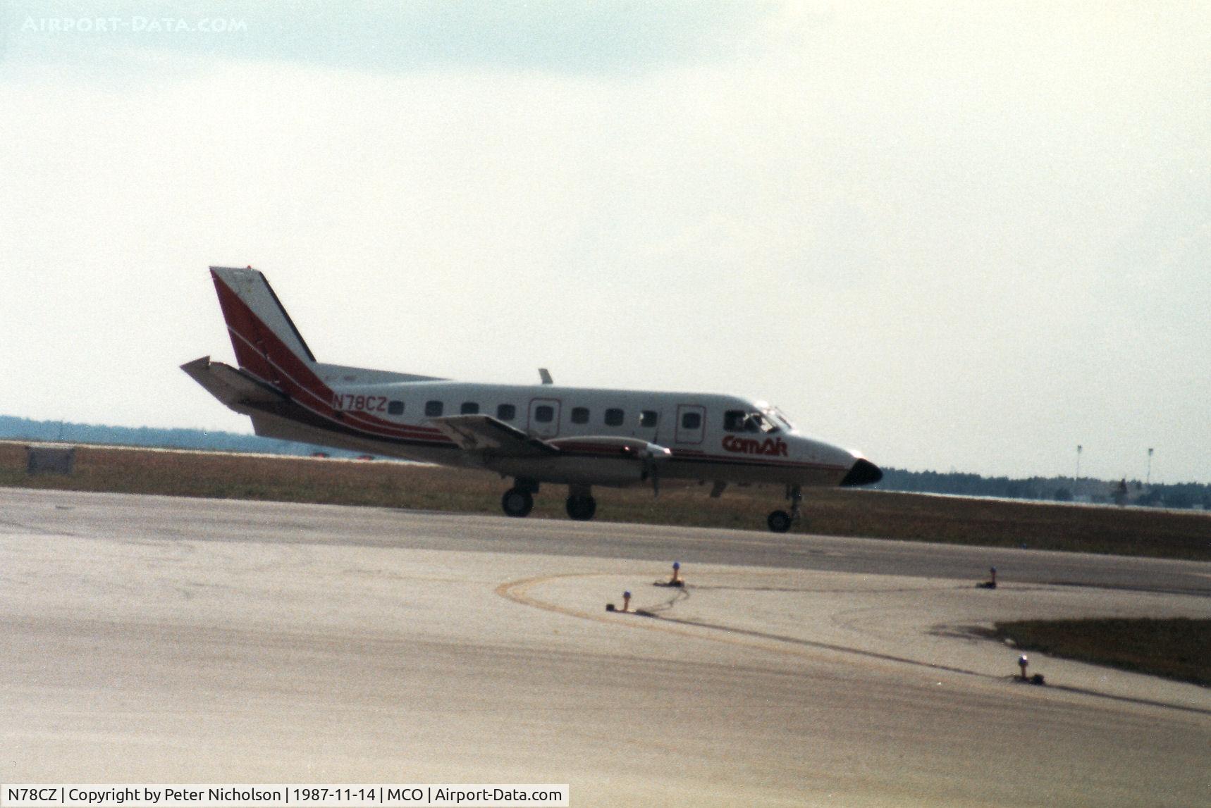 N78CZ, Embraer EMB-110P1 Bandeirante C/N 110358, Embraer Bandeirante of Comair taxying to the active runway at Orlando in November 1987.