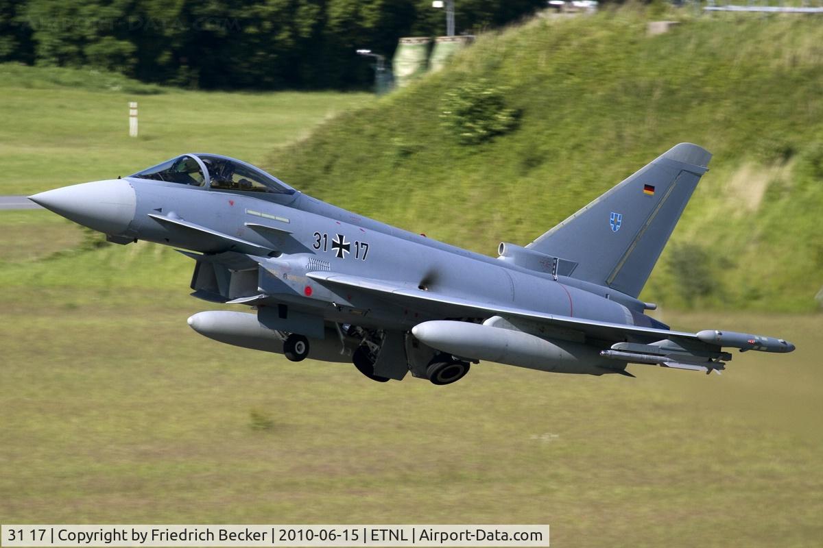 31 17, 2009 Eurofighter EF-2000 Typhoon S C/N AS010, gear up