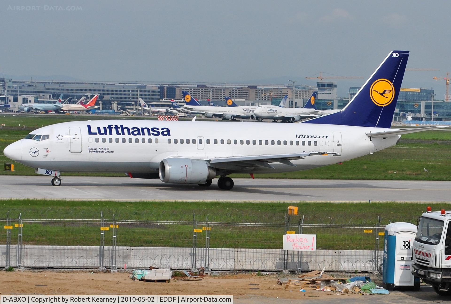 D-ABXO, 1987 Boeing 737-330 C/N 23873, Lufthansa heading for tha far r/w with early morning traffic in the background