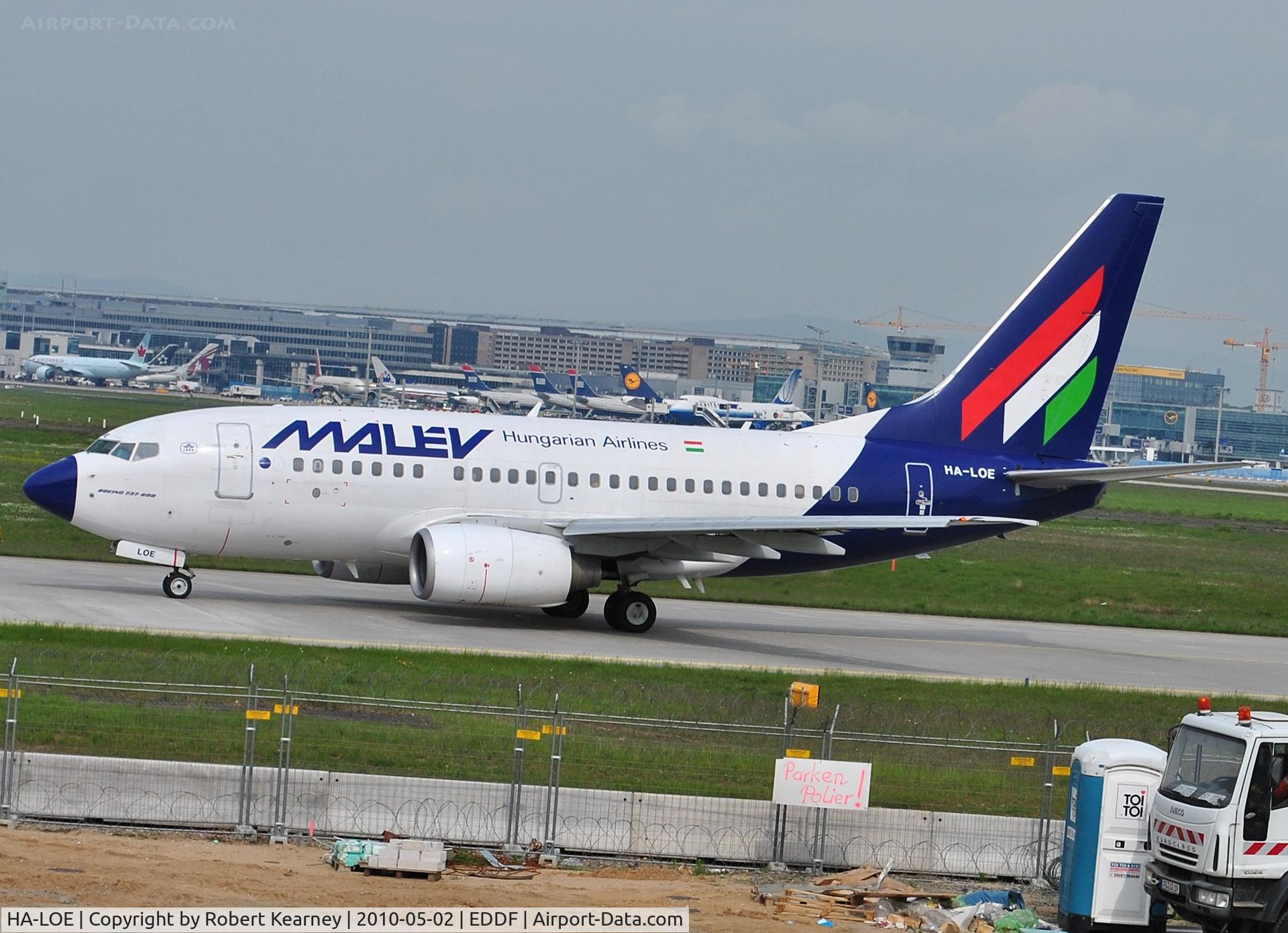 HA-LOE, 2003 Boeing 737-6Q8 C/N 28260, Malev heading to the distant r/w