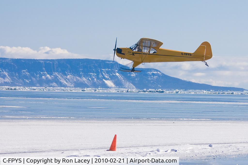 C-FPYS, 1941 Piper J3C-65 Cub Cub C/N 7494, Low pass over Lake Superior.