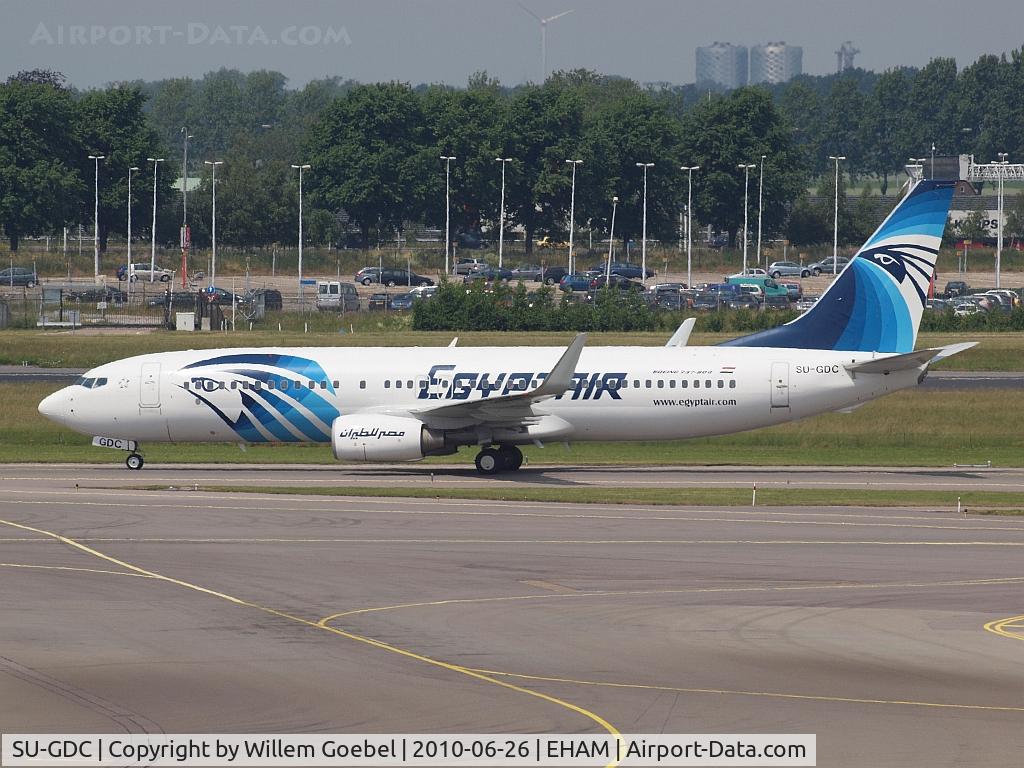 SU-GDC, 2009 Boeing 737-866 C/N 35564, From the promenade of airport Schiphol AMS