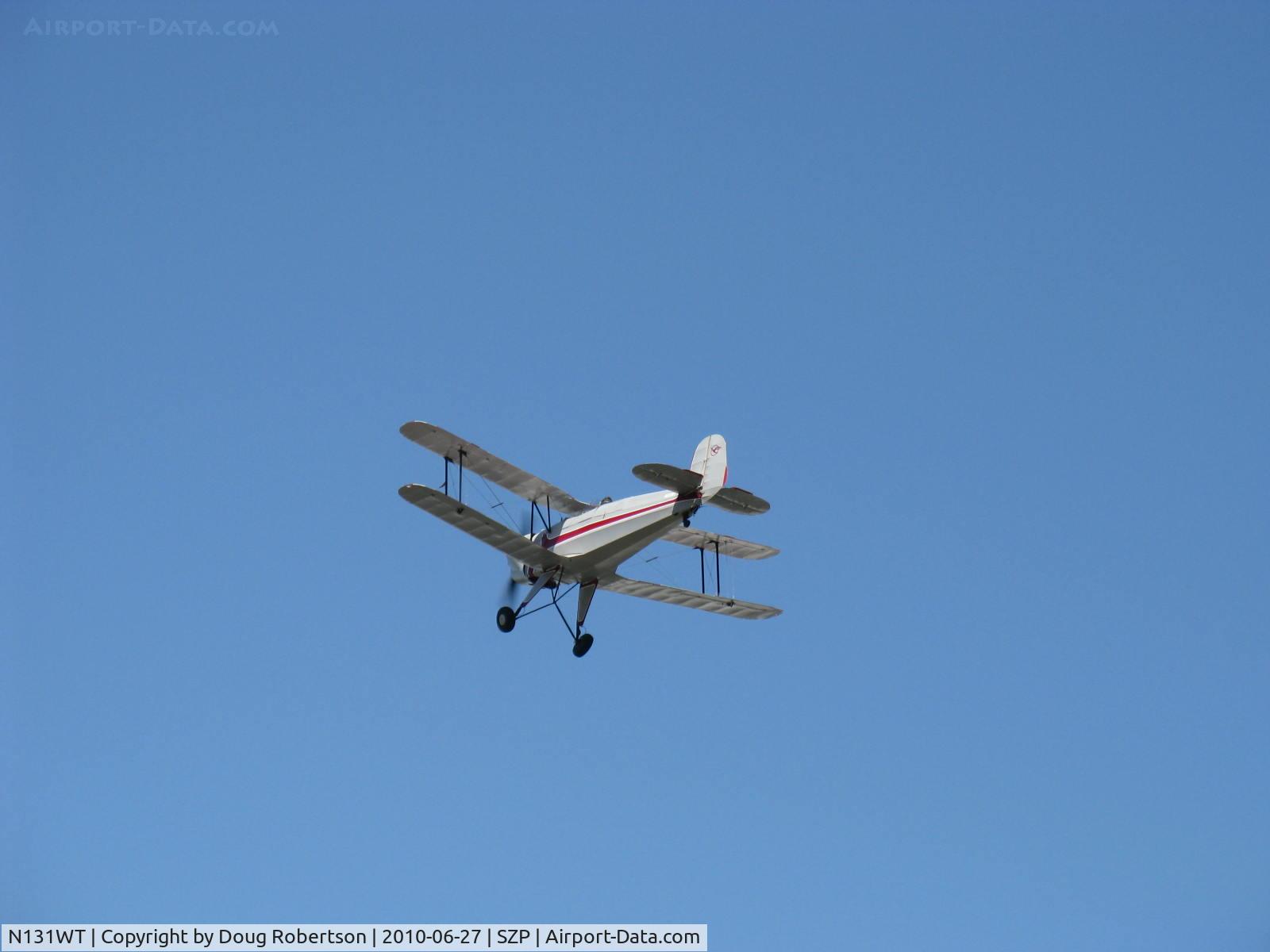 N131WT, 1954 CASA 1-131E Jungmann C/N 2020, 1954 Trautman C.A.S.A. Bucker JUNGMANN, Lycoming O-360 180 Hp, takeoff climb Rwy 22