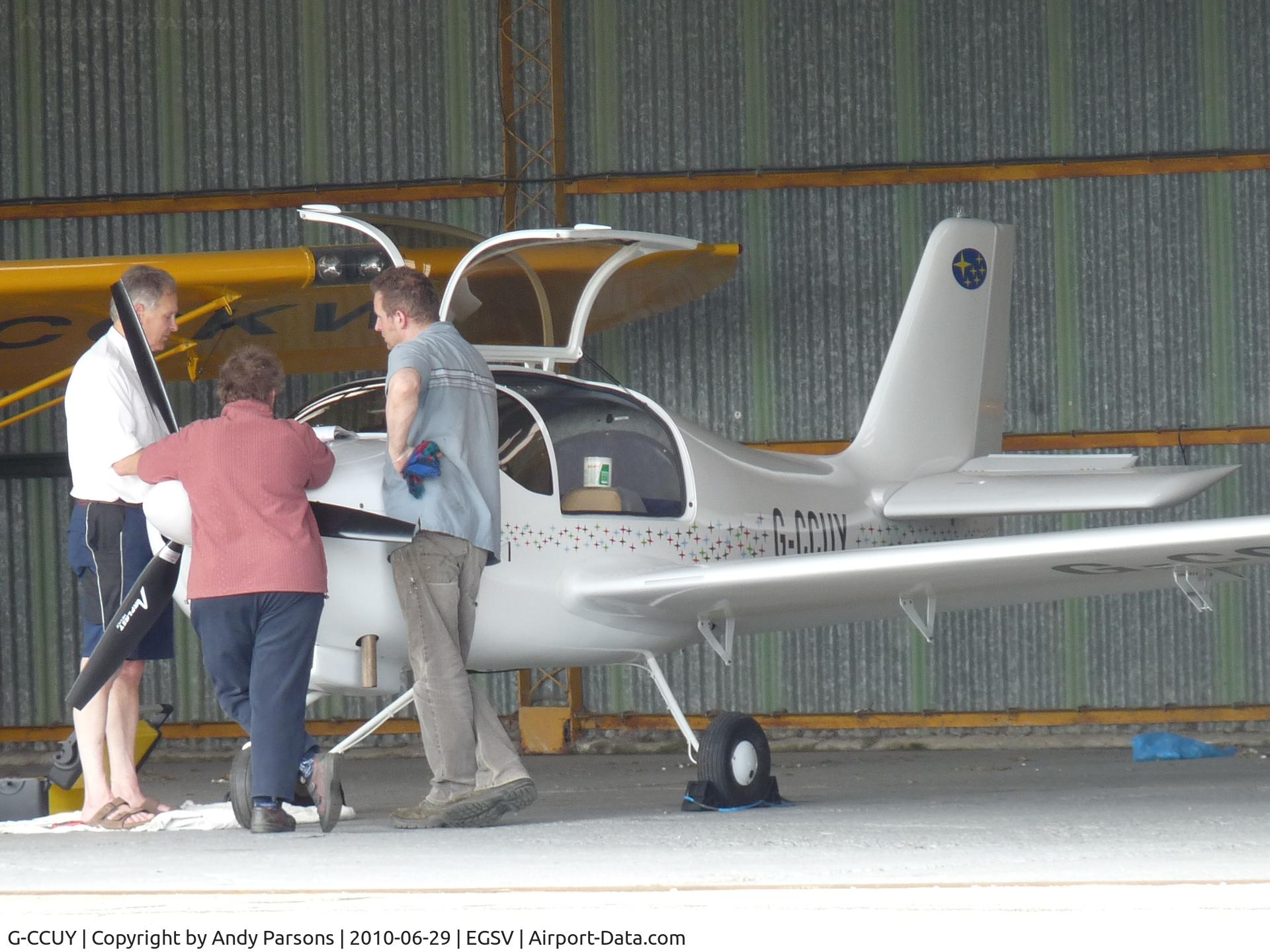 G-CCUY, 2005 Europa Tri Gear C/N PFA 247-13189, Being prepared for flying  in hanger at Old Buckenham
