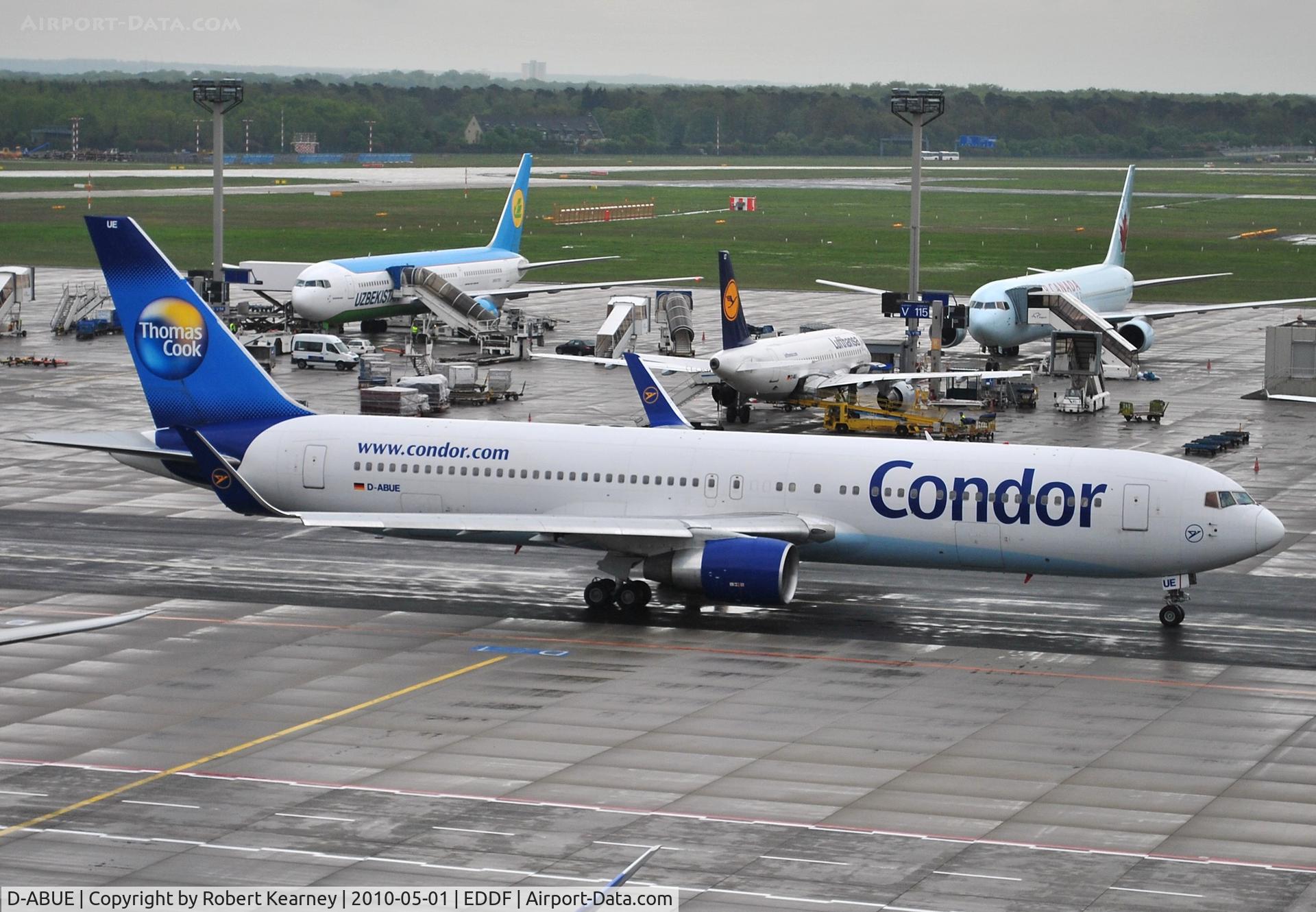 D-ABUE, 1993 Boeing 767-330/ER C/N 26984, Condor taxiing for departure on a very wet morning