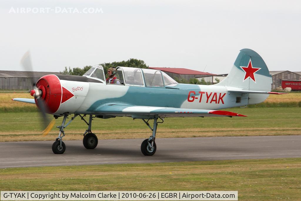 G-TYAK, 1989 Bacau Yak-52 C/N 899907, Bacau Yak-52 at Breighton Airfield in June 2010.