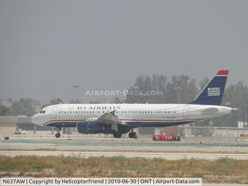 N637AW, 1990 Airbus A320-231 C/N 099, Just landed on runway 26R and is preparing to taxi back to terminal