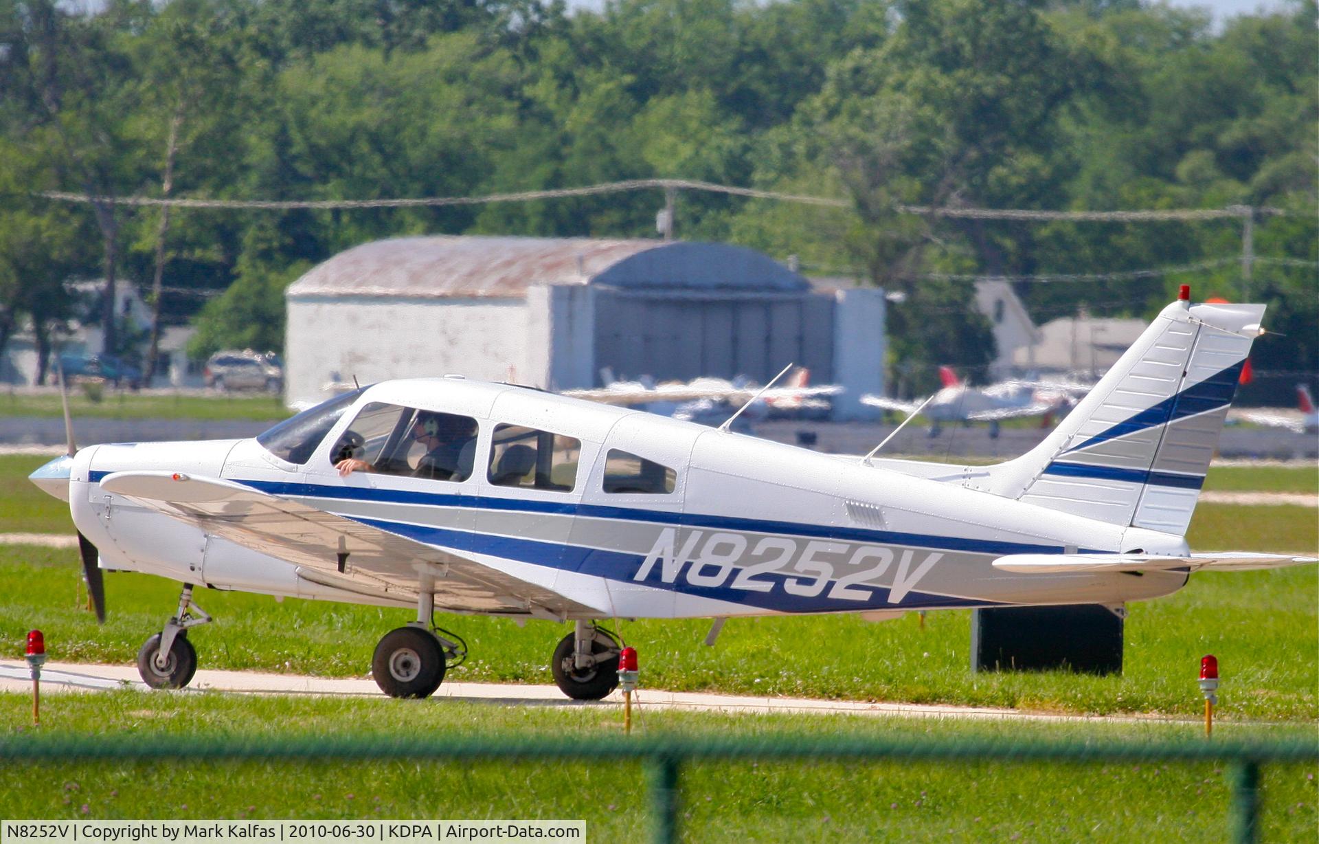 N8252V, 1980 Piper PA-28-161 C/N 28-8116010, TRAVEL EXPRESS AVIATION, Piper PA-28-161 Warrior II lining up on RWY 33 KDPA for some pattern work.