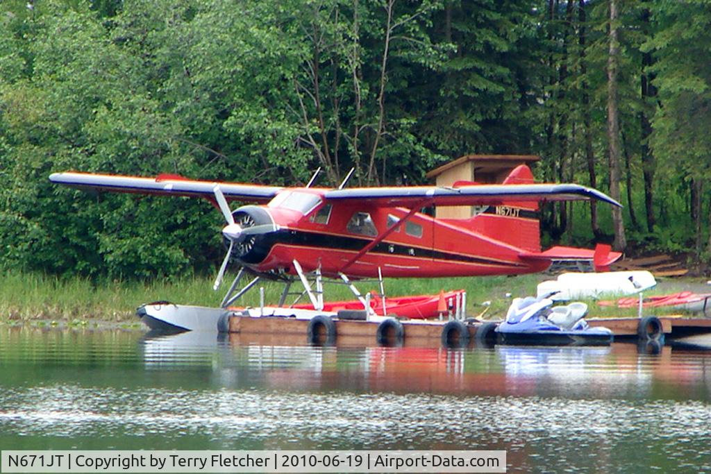 N671JT, 1957 De Havilland Canada DHC-2 Beaver Mk.I C/N 1040, 1957 Dehavilland DHC-2 MK 1, c/n: 1040 a distant view across Soldotna Longmere Lake