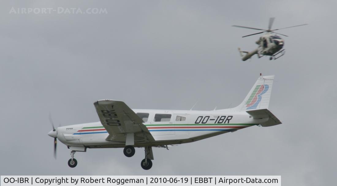 OO-IBR, Piper PA-32R-301R Saratoga SP C/N 32R-8213002, Brasschaat Airfield 100 years.Heli background G-12 Federal Police.