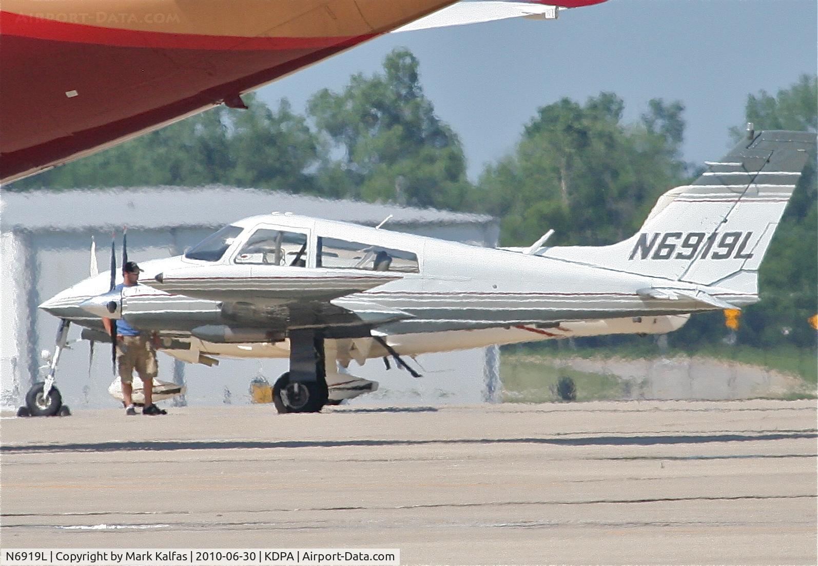 N6919L, 1965 Cessna 310K C/N 310K0019, DESTINY ONE LLC,  Cessna 310K N6919L on the ramp KDPA.