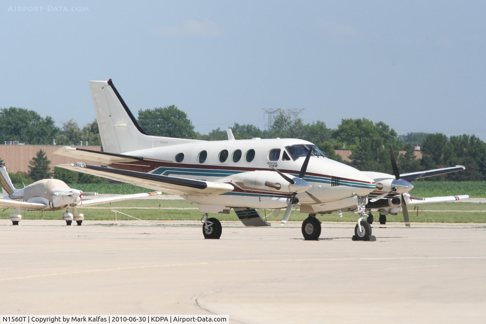 N1560T, 1994 Beech C90A King Air C/N LJ-1357, BLACK OAK LEASING LLC, Beechcraft King Air 90 N1560T on the ramp at KDPA after arriving from KSLE.