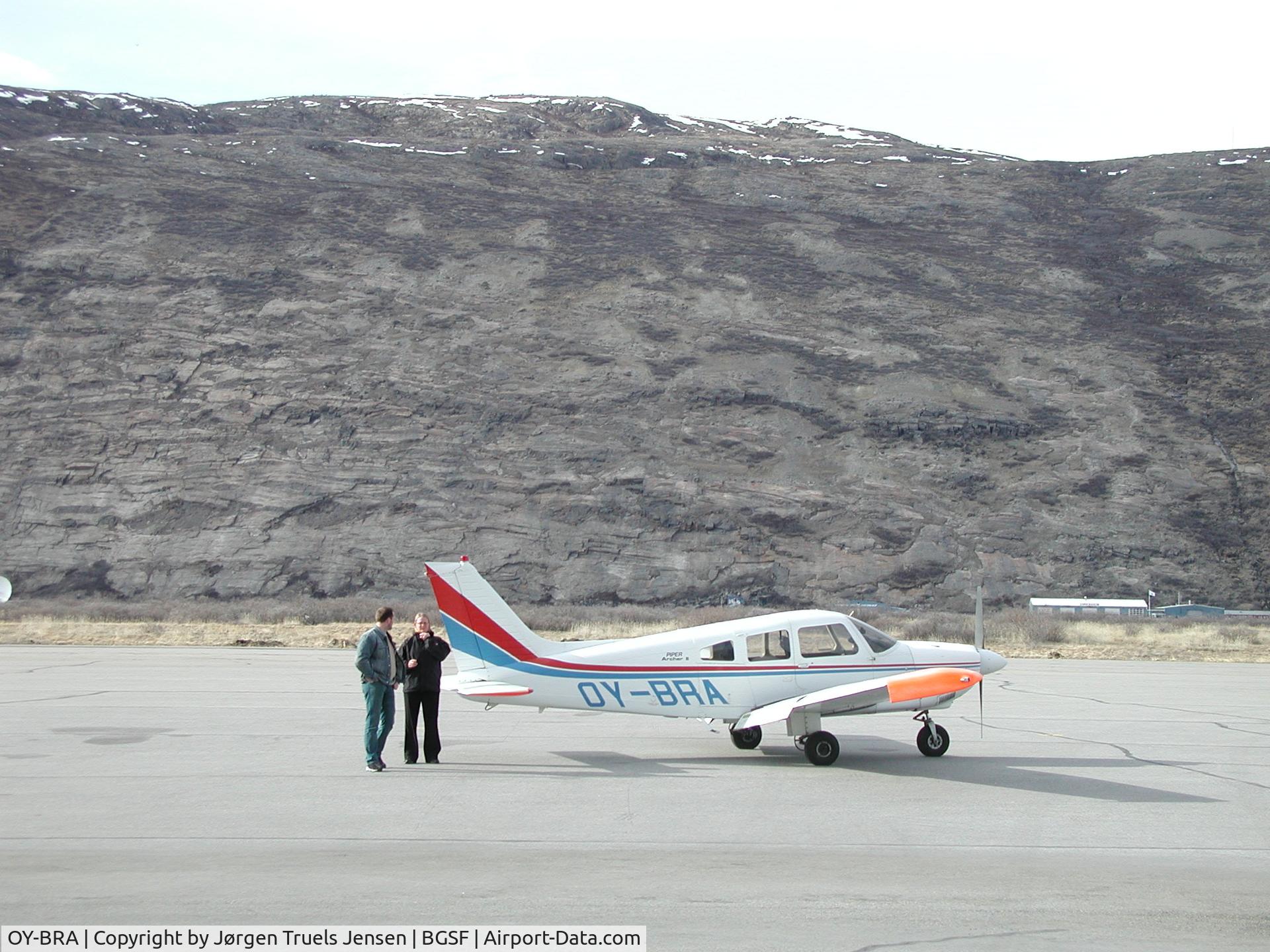 OY-BRA, 1978 Piper PA-28-181 C/N 28-7890426, Aircraft in good shape on a good day in Kangerslussuaq. Køkkenfjeldet (Mt. Kitchen) in the background.