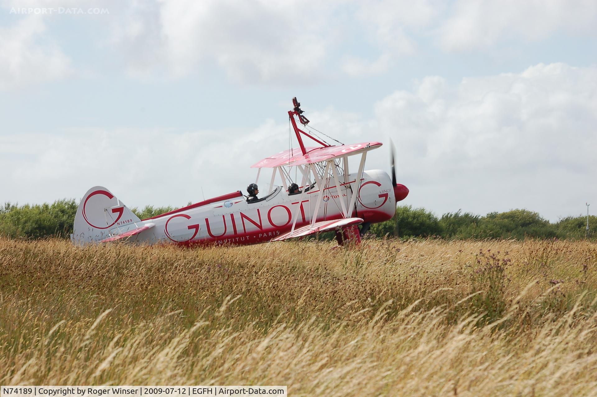 N74189, 1941 Boeing PT-17/R985 Kaydet (A75N1) C/N 75-717, Team Guinot (deux/2) taxing to departure.